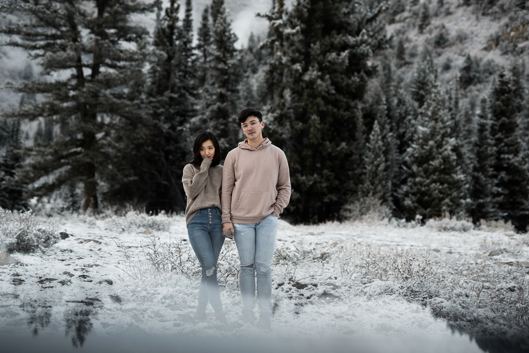 artistic portrait of couple in the snow