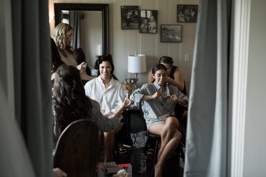 bride getting ready with her best friends