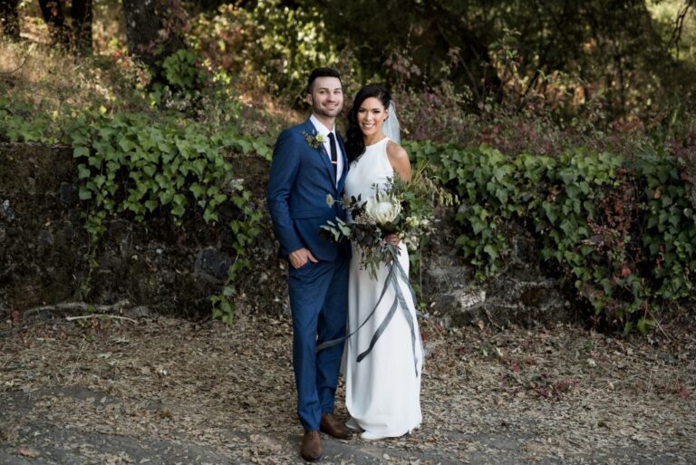 A couple smiles at the camera at their Yokayo Ranch Wedding