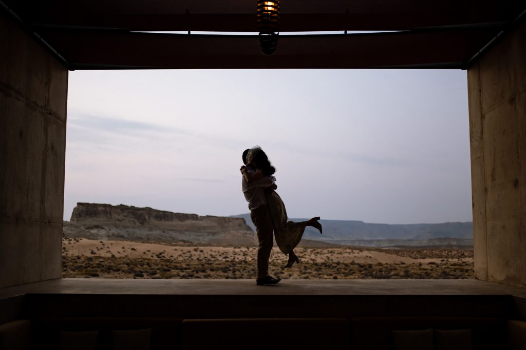 Couple silouetted and dancing in Amangiri.