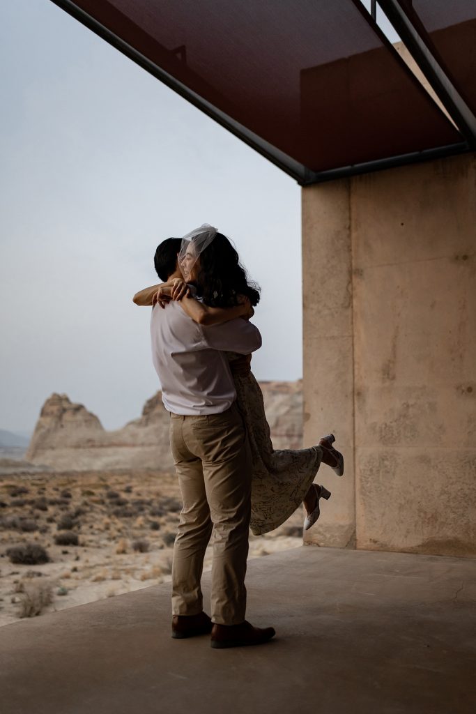 Couple dancing in Amangiri at sunset.