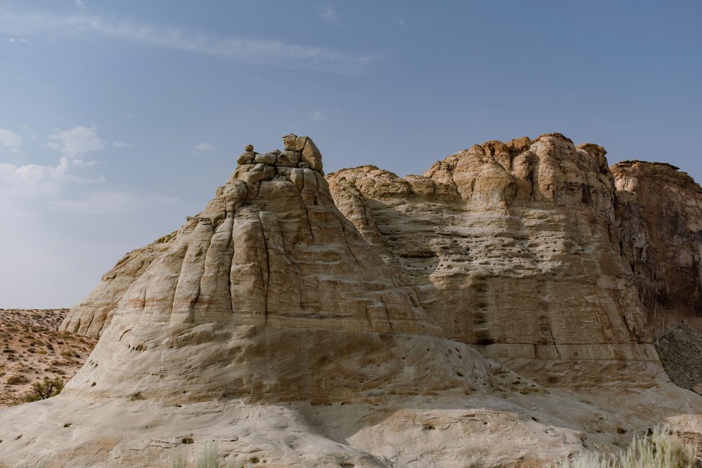 A landscape of desert bluffs.