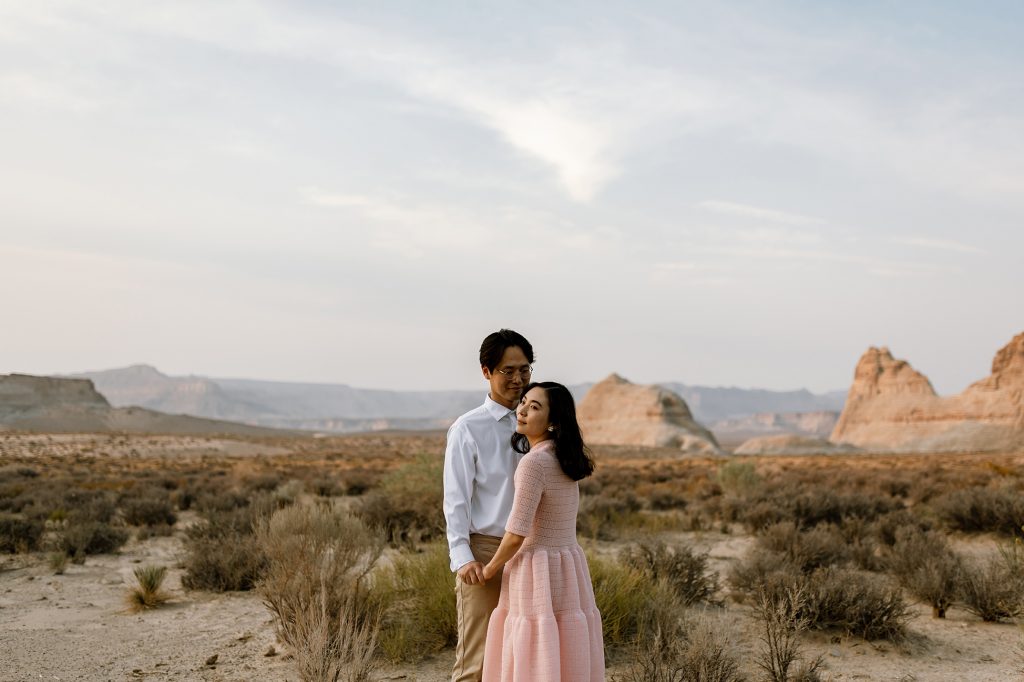 Husband and his wife finally come into each others arms in the dessert.