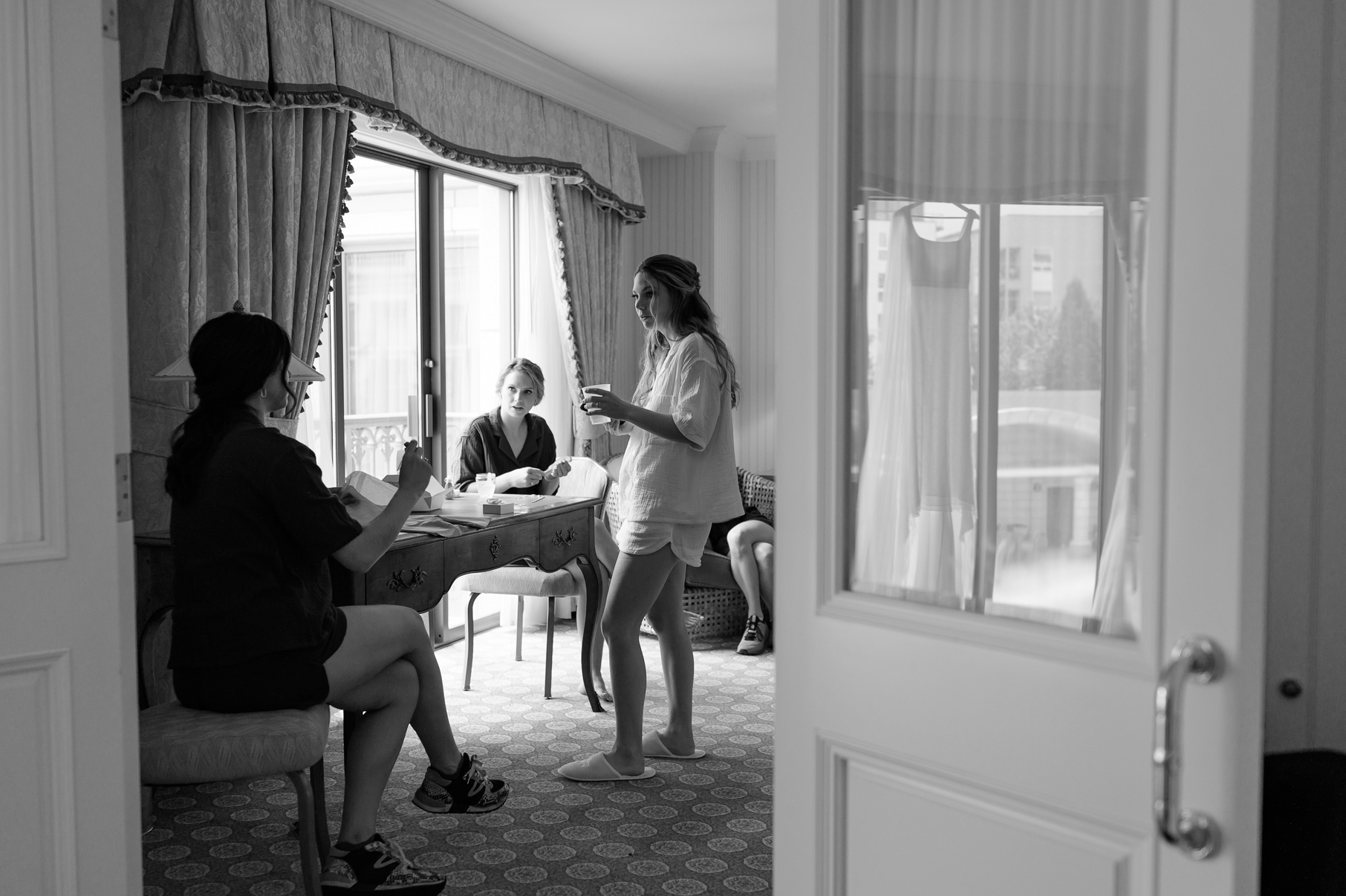 a bride talks to her friends at the grand america hotel