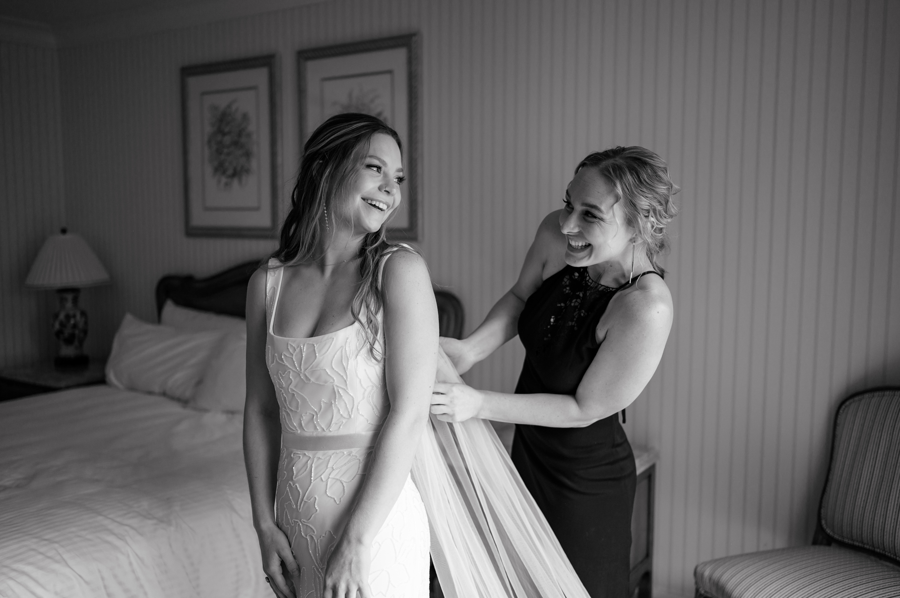 a bride gets dressed at grand america hotel