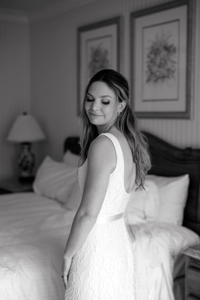 a bride gets dressed at grand america hotel