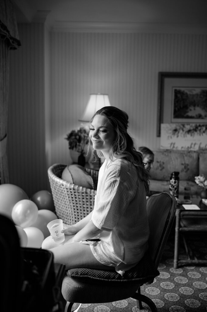 bride getting her makeup done at grand america hotel