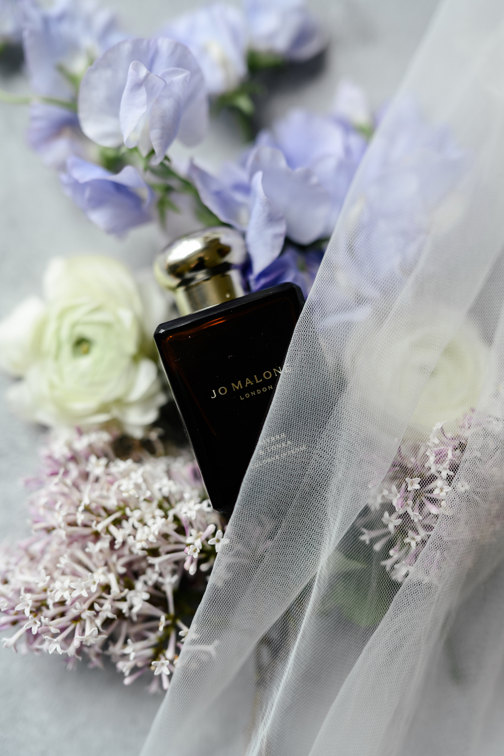 jo malone london on flowers with a veil