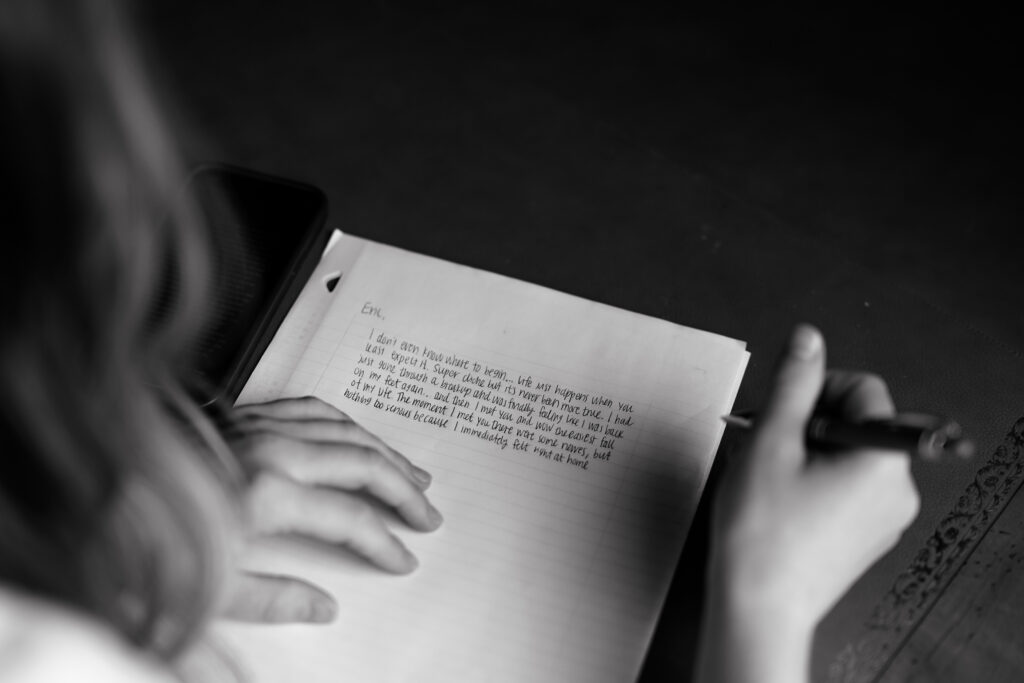 a bride writes her vows to her husband