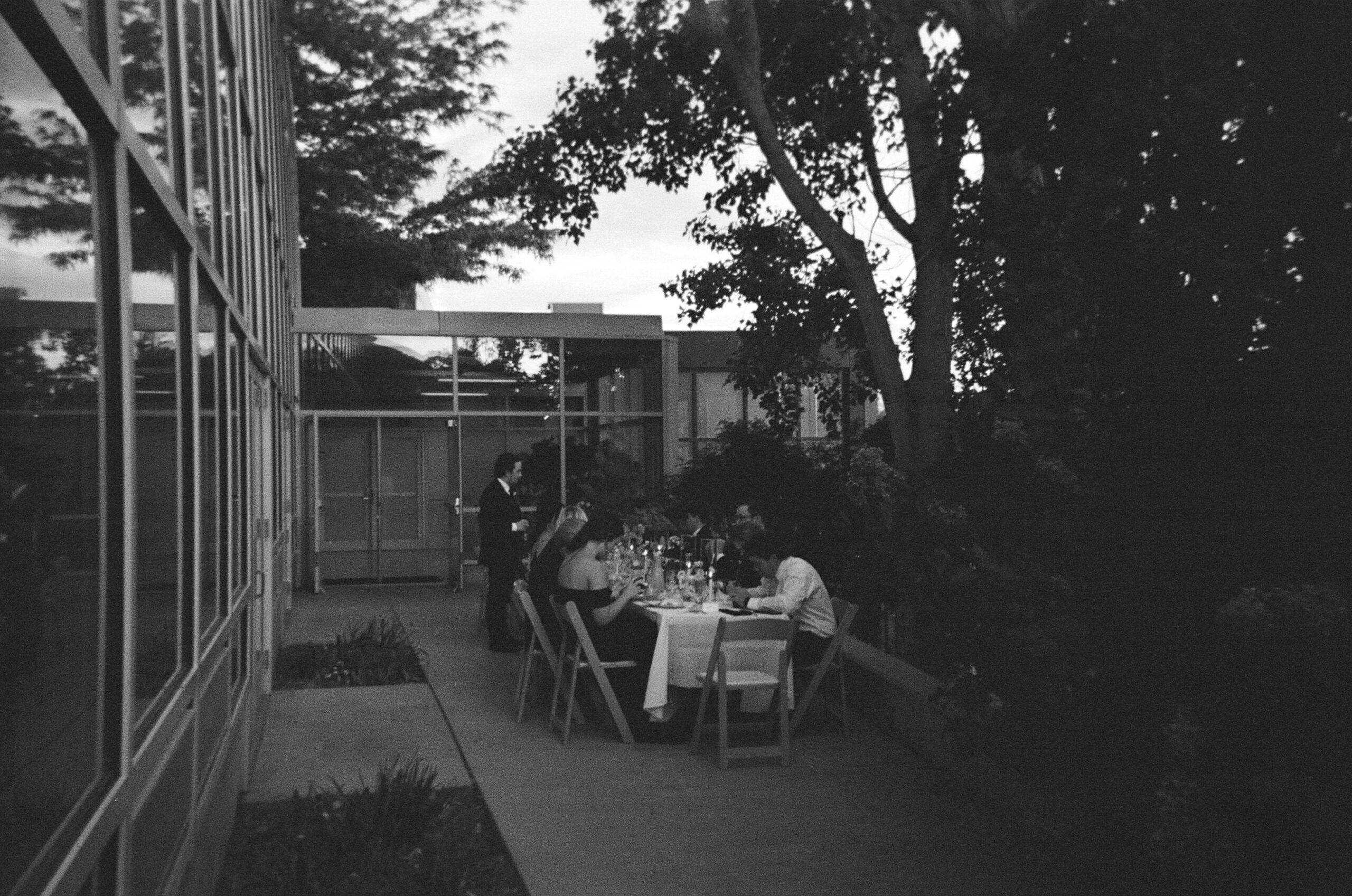 Disposable camera photo of a wedding dinner at red butte gardens