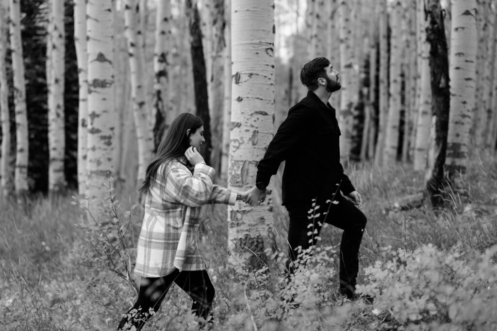 A couple together in the fall foliage of Park City