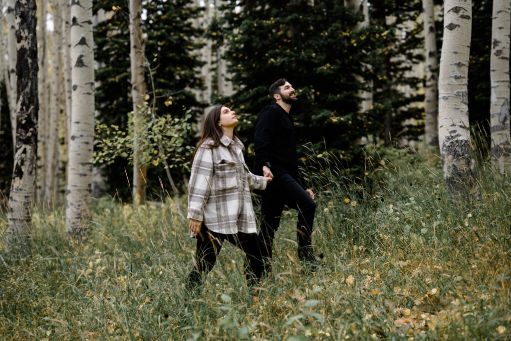 A couple together in the fall foliage of Park City