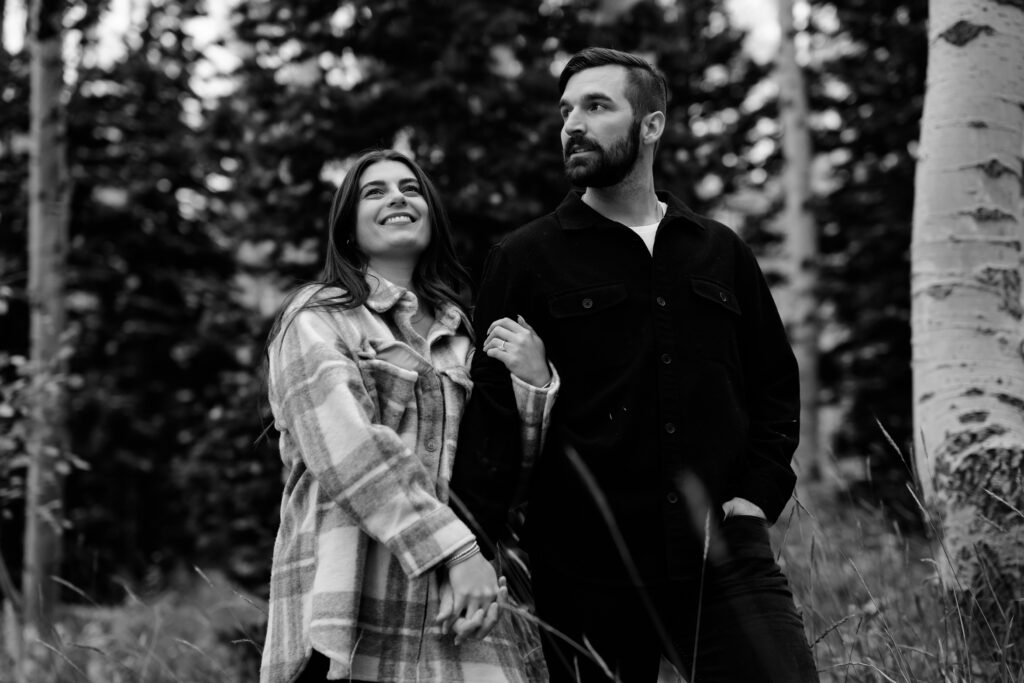 A couple together in the fall foliage of Park City