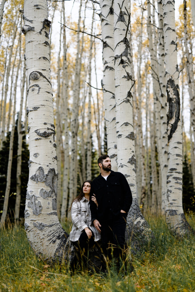 A couple together in the fall foliage of Park City