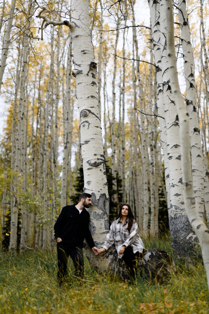 A couple together in the fall foliage of Park City