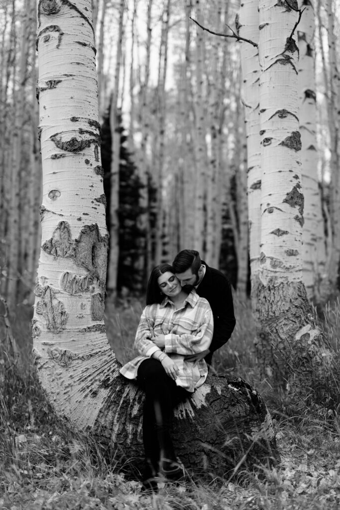 A couple together in the fall foliage of Park City