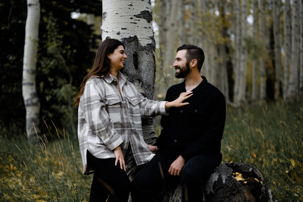 A couple together in the fall foliage of Park City