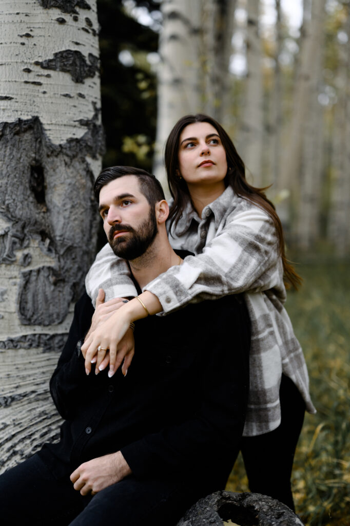 A couple together in the fall foliage of Park City